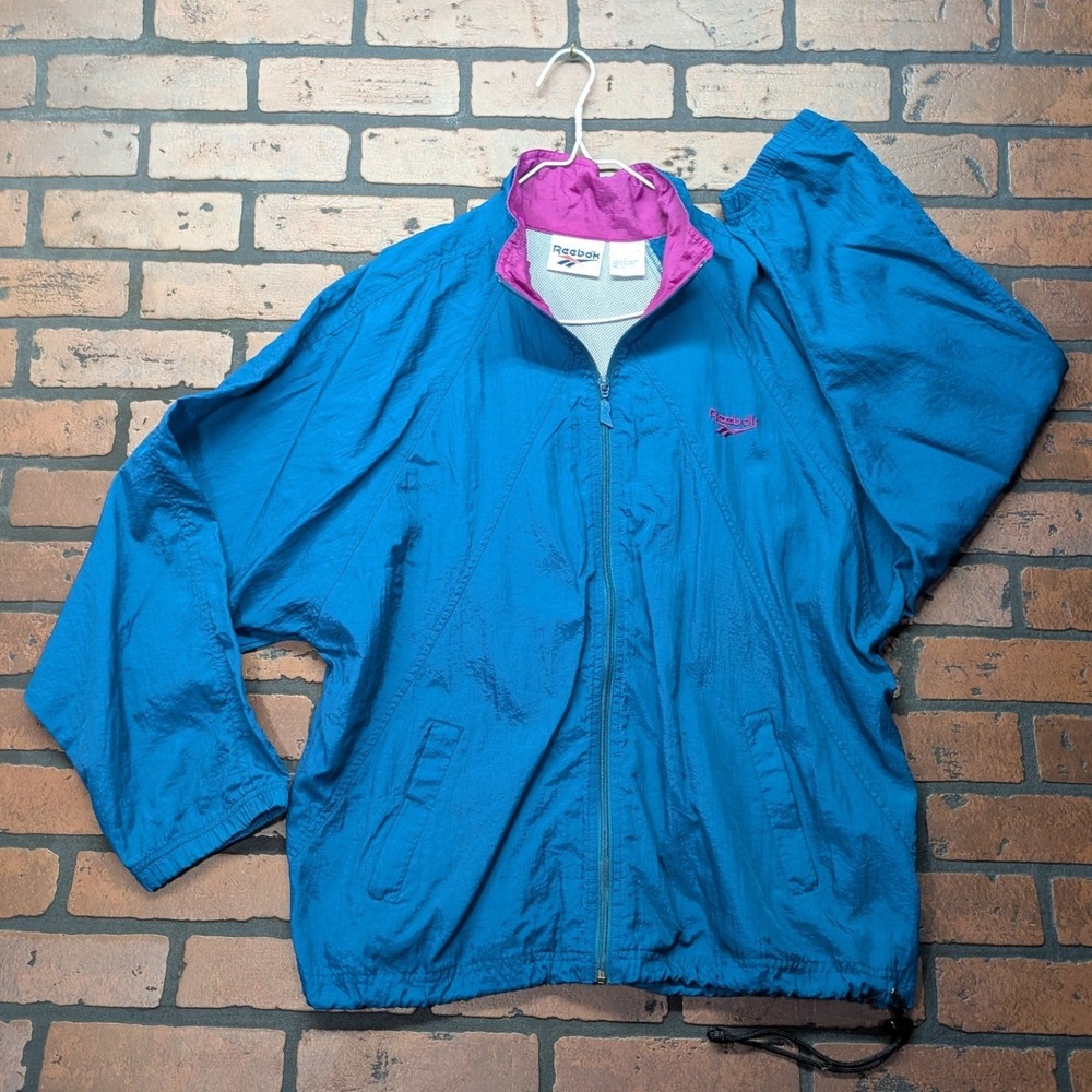 Reebok 90s Vintage Batwing Windbreaker M-L Bright Blue‎ Purple Logo Vented Baggy